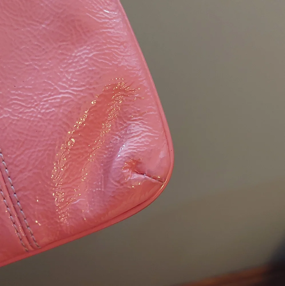 COACH Shiny Pebbled Leather Wristlet
